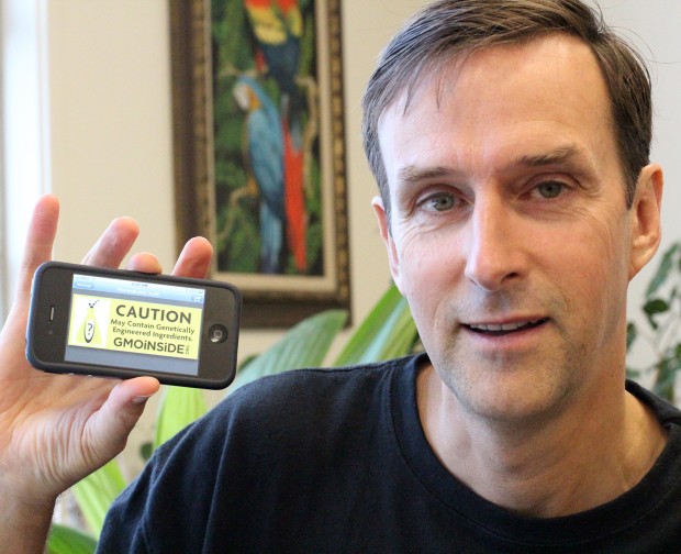 Nutiva CEO John Roulac demonstrates an example of a